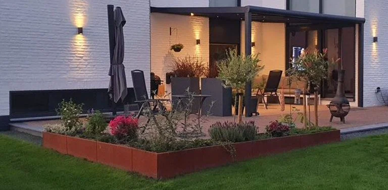 Ustvarite vzdušje z corten jeklom v vrtu